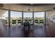 Exterior view of the common area with tables, chairs, and a waterfront view at 1950 59Th N Ave # 208, St Petersburg, FL 33714