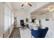 Bright office features wood-look floors, fresh white walls, and natural light from a large window at 1950 59Th N Ave # 208, St Petersburg, FL 33714