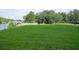 A large, well-maintained lawn stretches out behind a home, offering ample space for outdoor activities and relaxation at 2780 N Riverside Dr # 802, Tampa, FL 33602