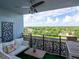 Relaxing balcony with comfortable seating and expansive neighborhood views at 2780 N Riverside Dr # 802, Tampa, FL 33602