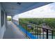 Enjoy beautiful scenic views from this condo balcony overlooking the tennis court and the green surrounding landscape at 2780 N Riverside Dr # 802, Tampa, FL 33602