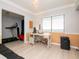 Bright home office with a large window, desk, and an adjacent exercise area at 2780 N Riverside Dr # 802, Tampa, FL 33602