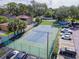 Aerial view of a tennis court next to a parking lot offering recreational opportunities at 2780 N Riverside Dr # 802, Tampa, FL 33602