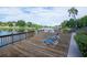 Waterfront view of deck with chairs and serene waterway at 2780 N Riverside Dr # 802, Tampa, FL 33602