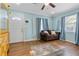 Comfortable living room featuring wood floors, and neutral wall paint at 3212 E Henry Ave, Tampa, FL 33610