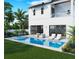 Inviting backyard pool area with lush landscaping, outdoor kitchen, and a second story balcony at 3406 W Arch St, Tampa, FL 33607