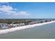 Stunning aerial view of beachfront property with easy access to sandy shores and the calm ocean at 36 Gulf Blvd # 3, Indian Rocks Beach, FL 33785