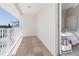 Spacious balcony with tile flooring offers picturesque views and outdoor relaxation at 36 Gulf Blvd # 3, Indian Rocks Beach, FL 33785