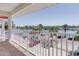 Enjoy picturesque water views from the charming balcony overlooking the canal and vibrant street at 36 Gulf Blvd # 3, Indian Rocks Beach, FL 33785