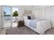 This comfortable bedroom features a waterfront view and ample closet space at 36 Gulf Blvd # 3, Indian Rocks Beach, FL 33785