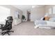 Spacious bedroom features neutral color scheme and an area that is set up as an office space at 36 Gulf Blvd # 3, Indian Rocks Beach, FL 33785