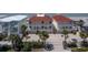Beachside two-story home with red roof, multiple balconies and ample parking near white sand at 36 Gulf Blvd # 3, Indian Rocks Beach, FL 33785
