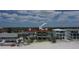 Beautiful beachfront homes with lush landscaping, red tile roof, and inviting curb appeal at 36 Gulf Blvd # 3, Indian Rocks Beach, FL 33785