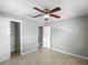 Bedroom features tile floors, ceiling fan with lighting, window and closet at 3702 W Reynolds St, Plant City, FL 33563