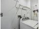 Laundry room features white washer, wire shelving and hook ups at 3702 W Reynolds St, Plant City, FL 33563