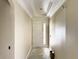 Bright foyer featuring high ceilings, white trim, and an entry door with side-light window at 410 Shannon Estates Ct, Plant City, FL 33563