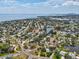 Peaceful neighborhood with tree-lined streets, waterfront access, and a sense of community indicated by a red arrow at 4501 Huntington Ne St, St Petersburg, FL 33703