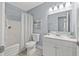 Bathroom features updated fixtures, a new toilet, and a shower with modern tile at 4501 Huntington Ne St, St Petersburg, FL 33703