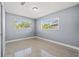 Bedroom with neutral walls, lots of natural light and carpeted floor at 4501 Huntington Ne St, St Petersburg, FL 33703