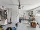Organized two-car garage with ample storage space and a clean, epoxy-coated floor at 4501 Huntington Ne St, St Petersburg, FL 33703