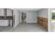 Spacious living room with tile flooring awaiting renovation at 4501 Huntington Ne St, St Petersburg, FL 33703