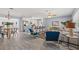 Open living area with a combined dining and kitchen space, and stylish decor at 4501 Huntington Ne St, St Petersburg, FL 33703