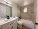 Bathroom with updated vanity, modern fixtures, and a tiled shower-tub combo at 4623 Irene Loop, New Port Richey, FL 34652