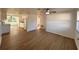 Spacious living room featuring hardwood floors and a ceiling fan at 4623 Irene Loop, New Port Richey, FL 34652
