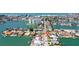 A street in a beautiful waterfront neighborhood with docks and water access at 511 64Th Ave, St Pete Beach, FL 33706