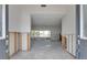 View from the front door into a spacious, light-filled interior that is under renovation at 511 64Th Ave, St Pete Beach, FL 33706