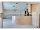 Open kitchen featuring light cabinets, tile floors and stainless steel appliances at 511 64Th Ave, St Pete Beach, FL 33706
