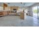 Spacious kitchen layout with center island and exterior views to the pool at 511 64Th Ave, St Pete Beach, FL 33706