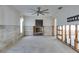 Open living area with ceiling fan at 511 64Th Ave, St Pete Beach, FL 33706