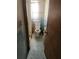 A cramped, outdated bathroom offering potential for a stylish renovation and modern upgrades at 601 Park Blvd, Oldsmar, FL 34677