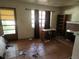 Outdated living room featuring a fireplace and tile flooring, ready for renovation and personalization at 601 Park Blvd, Oldsmar, FL 34677