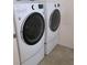 Modern laundry room with LG front load washer and dryer at 603 5Th S St, Safety Harbor, FL 34695