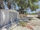 Spacious backyard featuring white rock landscaping, a storage shed, and a wood fence, offering a functional and private outdoor space at 6609 Dartmouth N Ave, St Petersburg, FL 33710