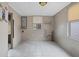 Spacious basement with tile flooring, bright lighting, and access to laundry and other rooms at 7141 56Th N St, Pinellas Park, FL 33781