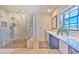 Bathroom featuring a shower with a built-in bench and pebble floor at 7509 Hackamore Rd, Zephyrhills, FL 33541