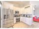 Kitchen featuring stainless steel appliances and white cabinets at 7509 Hackamore Rd, Zephyrhills, FL 33541