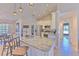 Kitchen featuring an island, stainless steel appliances, and modern lighting at 7509 Hackamore Rd, Zephyrhills, FL 33541