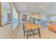 Open-concept view of a kitchen, dining and living area, perfect for gathering and entertaining at 7509 Hackamore Rd, Zephyrhills, FL 33541