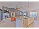 Open-concept floor plan featuring a living room and kitchen at 7509 Hackamore Rd, Zephyrhills, FL 33541