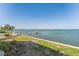 Scenic water view showcasing the serene waterfront and lush surroundings at 7520 Sunshine Skyway S Ln # 110, St Petersburg, FL 33711
