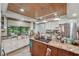 Spacious kitchen featuring granite countertops, stainless steel appliances, and ample natural light at 8614 Hibiscus Dr, Tampa, FL 33637