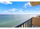 Balcony overlooking serene ocean views and blue skies at 9 Haig Pl # 510, Dunedin, FL 34698