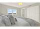 Bright bedroom featuring a comfortable bed, spacious closet, and a window view, creating a serene atmosphere at 9 Haig Pl # 510, Dunedin, FL 34698