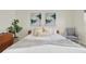 Bright bedroom featuring stylish decor and a comfortable bed, creating a welcoming and serene atmosphere at 9 Haig Pl # 510, Dunedin, FL 34698