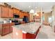 Spacious kitchen with granite countertops, stainless steel appliances, and a large island with bar seating at 10617 Lucaya Dr, Tampa, FL 33647