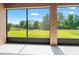 The screened lanai has tranquil views of the backyard, pond and landscaping at 10617 Lucaya Dr, Tampa, FL 33647